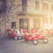 Citta della Pieve, Italy - September 22, 2018: Typical street scene with a red scooters on an old cobblestoned street