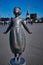 City attraction. Statue of unknown little girl in port of Klaipeda, Lithuania on sunny day