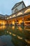 City of Bath, UK. 07-08-2021. Evening sightseeing of restored ancient Roman Baths in the light of sconces