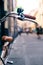 City bicycle handlebar, bike over blurred beautiful bokeh backgr