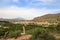 City of Blanca from behind greenery surrounded by mounts in the Region of Murcia, Spain