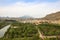 City of Blanca from behind greenery surrounded by mounts in the Region of Murcia, Spain