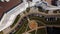 City block. Modern multi-storey buildings. The courtyard area and playgrounds are visible. Aerial photography