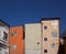 City buildings against deep blue sky