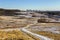 City of Calgary Skyline and Nose Hill Urban Park Landscape on a cold but sunny winter day in Alberta, Canada