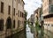 The city canal San Massimo runs among residential houses in the centre of the old city Padua, Veneto,