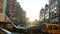 City cars move in traffic jam time-lapse, vehicles dusk sunlight