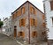 City center houses restoring in a narrow street in Cunda Alibey Island, Ayvalik. It is a small