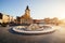 City central square (Piata Sfatului) with town council hall tower, fountain morning sunrise view, location Brasov, Transylvania,