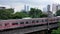 City commuter train passes by at speed in Jakarta