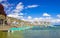 The city Constance on the Lake Constace, Bodensee. The view of port with tree park and pedal boats. The city lies in Germany and