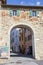 City door entrance at Castiglione del Lago. Tuscany. Italy.