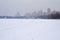 City Embankment under the snow, icy river.