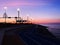 city Evening promenade at port pier city light people walking on horizon sunset pink sea and sky panorama Tallinn Estonia