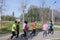 The city green way with many runners in a sunny afternoon