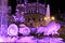 City Hall building and Cibeles fountain illuminated in purple for Women's Day