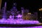 City Hall building and Cibeles fountain illuminated in purple for Women's Day