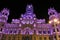 City Hall building illuminated in purple for Women's Day