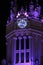 City Hall building illuminated in purple for Women's Day