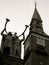 City Hall Tower on City Hall Square Copenhagen with Lur Blowers bronze statue by Siegfried Wagner. Black and white