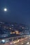 It is city illuminated Moon astronomy start space snowing Road motion straight Light sky