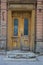 City Jelgava, Latvian Republic. Old wooden doors, house exterior. Jun 9. 2019. Travel photo