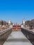 City landscape. Lock No. 7 of the Moscow-Volga navigable river channel named after Moscow in early spring. View from the public