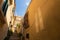 City landscape of old Sicilian Modica city. Sandstone houses, stairway and balconies, courtyards with nobody inside. Bright sunny