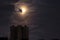 City landscape. Roofs of buildings against a black night sky wit