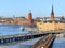 City landscape. Town Hall StadHuset, Central Bridge Centralbron and train on Subway bridge