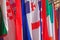 City landscape - view of the hanging flags of different countries closeup