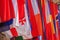 City landscape - view of the hanging flags of different countries closeup