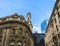 City life in the Royal Exchange area. A mixture of old and new buildings.