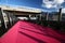 City Lightpath. Urban walkway in pink color for bicycle riders. Nelson Street Cycleway, Auckland, New Zealand