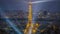 City lights of Paris, illuminated Eiffel Tower and skyscrapers, dusk to night