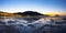 City lights reflected on Zarautz beach at night