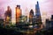 City of London at sunset. Multiple exposure image includes City of London financial aria. UK London