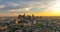 City of Los Angeles cityscape skyline scenic aerial view at sunset. Flying of los angels, filmed LA by drone.