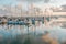 City marina skyline with yacht masts on the foreground