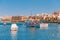 City Marsaskala Malta summer harbour Fishing boats in water mediterranean sea blue