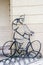 City Metal Sculpture of Biker in Corner at Bike Parking