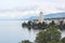 City Montreux in Switzerland on a foggy day. Buildings by beautiful Geneva Lake. Popular tourist destination, Swiss Riviera