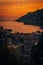 A city next to a body of water,  - view of Vietri sul Mare at sunset, on the Amalfi Coast in Campania, Italy