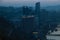 City night view of Chongqing, China after sunset. Skyscrapers on the banks of the Jialing River and the busy city traffic