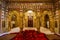 City Palace Jaipur medieval royal room with gold artwork at Rajasthan, India