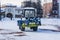 City Park, Balashikha, Russia - February 19, 2021. Mechanized cleaning of fallen snow with the help of harvesting equipment.
