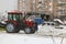 City Park, Balashikha, Russia - February 19, 2021. Mechanized cleaning of fallen snow with the help of harvesting equipment.