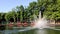 City park fountain with vibrant rainbow