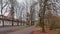 City park  and street towards the medieval city walls of Tallinn, Estonia.