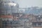 City pollution mixed with morning fog, Belgrade cityscape from roof top of the building in downtown